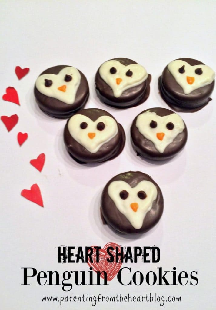 Whether you have a penguin lover in your life, or simply if you're looking for something non-pink or red this Valentine's Day, these penguin heart cookies are so cute! And while they are a little time consuming (covering the Oreos in chocolate), they aren't hard at all!