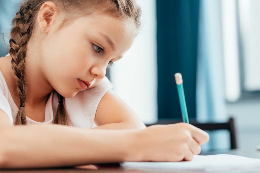 How should you respond when your child says she hates school? If your child starts to hate school, this is how to respond in a way that supports your child while working with the school to come up with a solution. #parenting #positiveparenting
