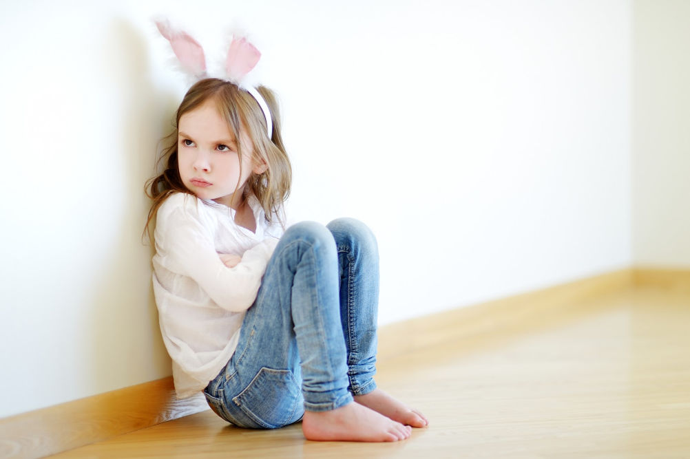 Frustrated girl who is strong-willed, wearing bunny ears, angry