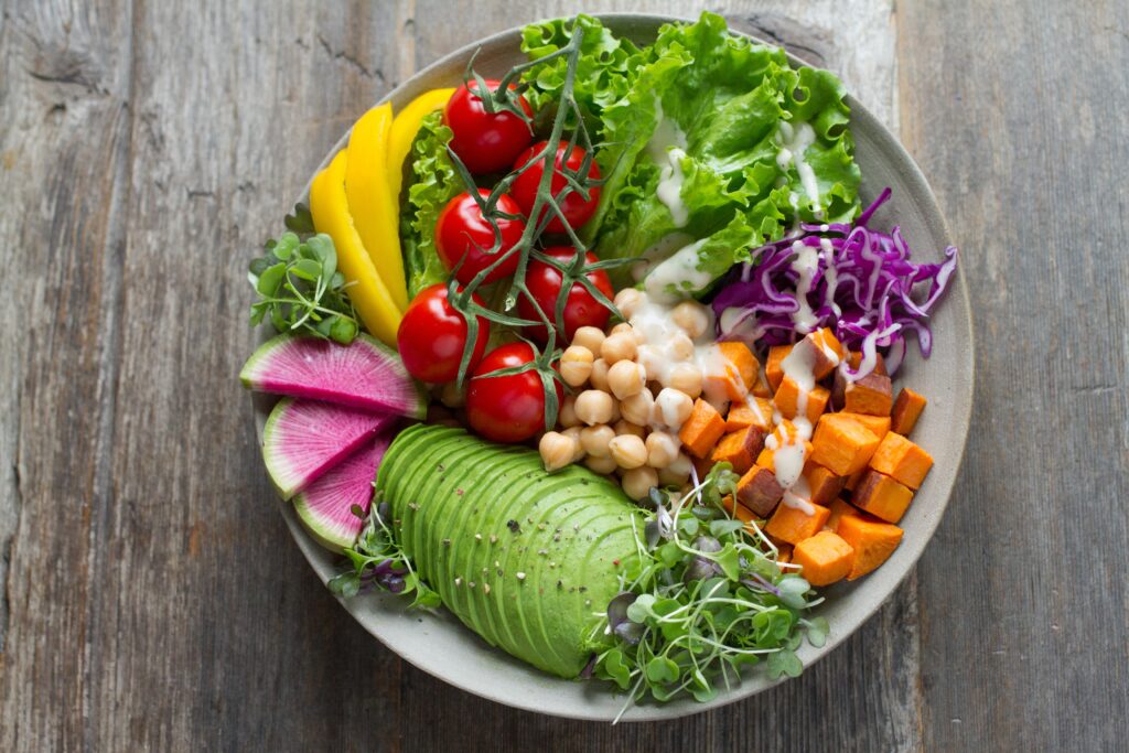 A plate filled with different healthy food for a well-balanced diet that picky eaters will love.