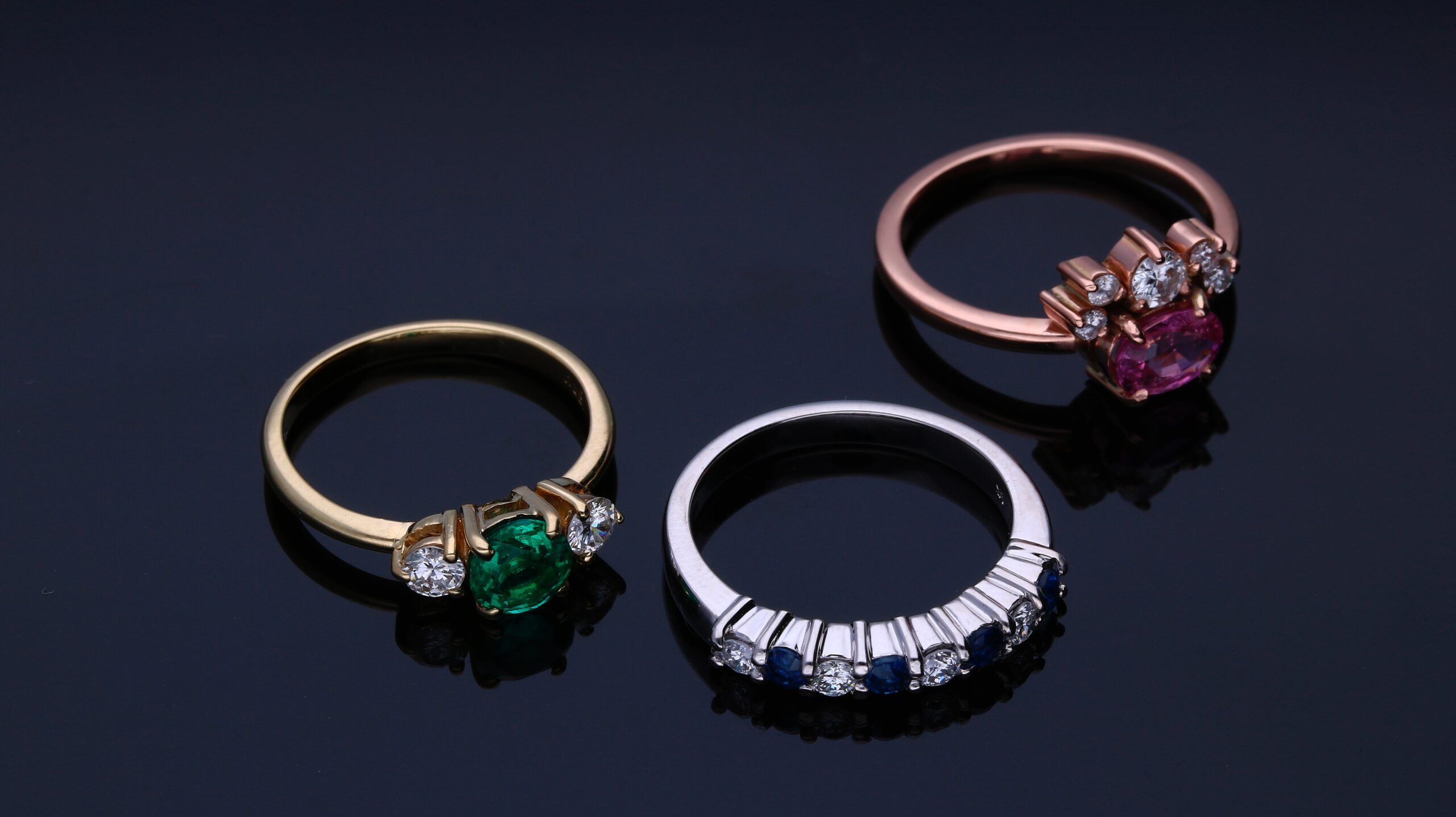 gold and silver rings with gemstones