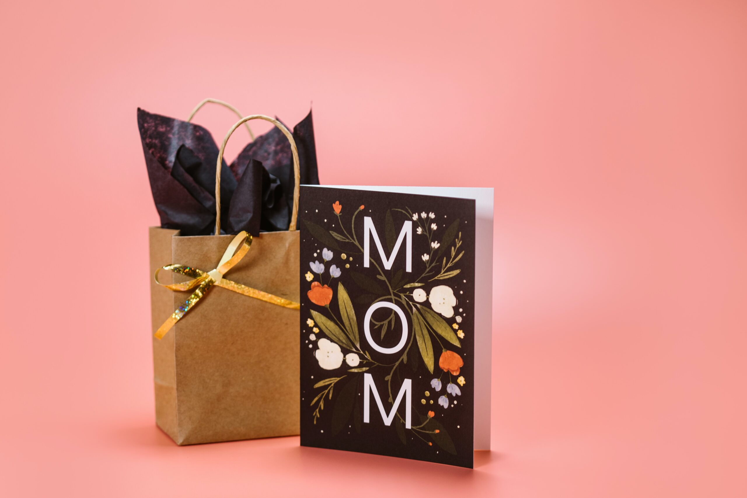 brown paper bag and a card that says mom